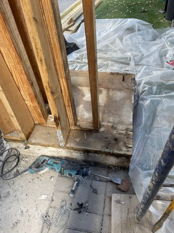 Opened wall area at the base of an exterior window