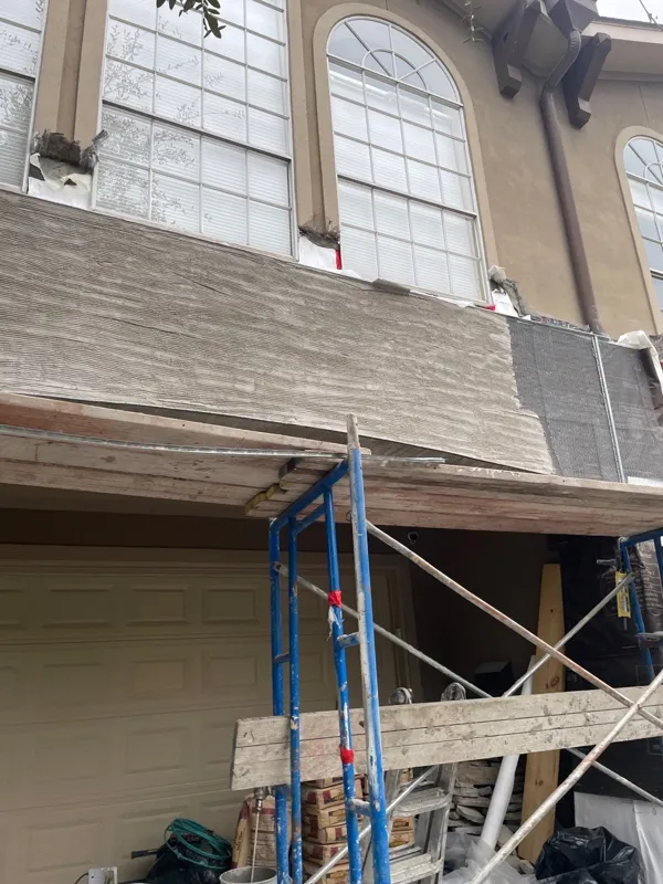 Scaffolding and exterior wall during repair work