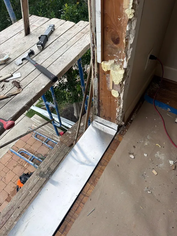Exposed deck-edge and wall connection