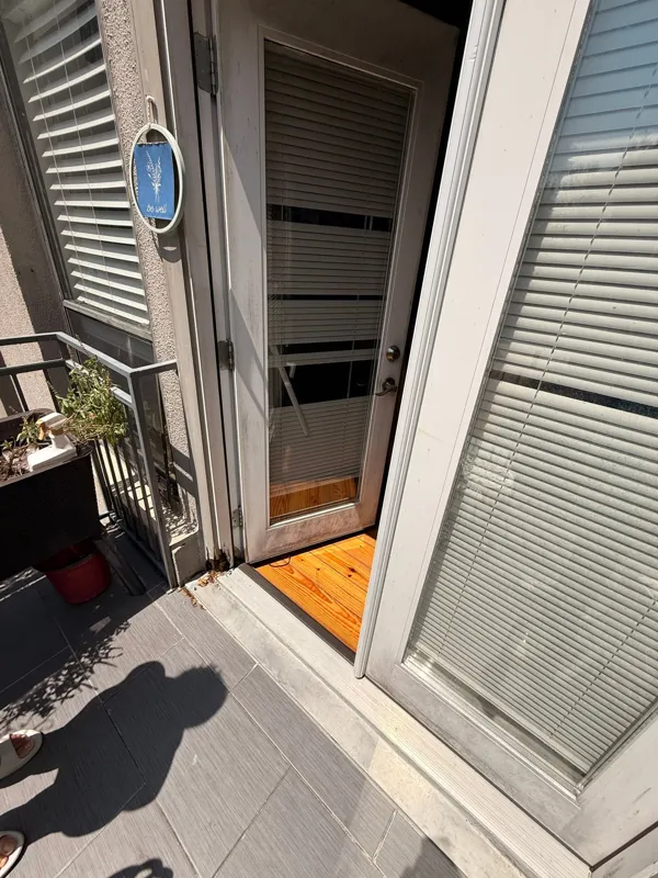 Balcony surface beside an exterior door