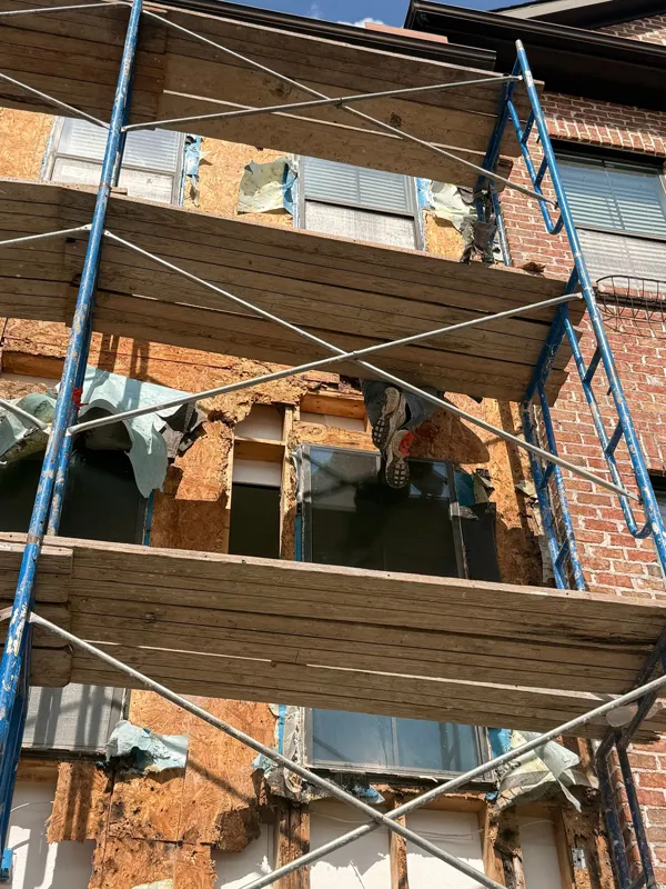 Scaffolding positioned for work around the upper windows