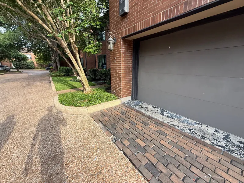 Garage threshold and adjoining driveway surface