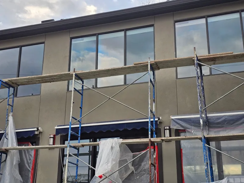 Window wall with scaffolding in place