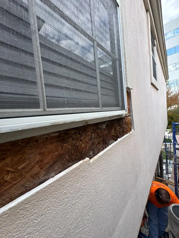Exposed material beneath a window