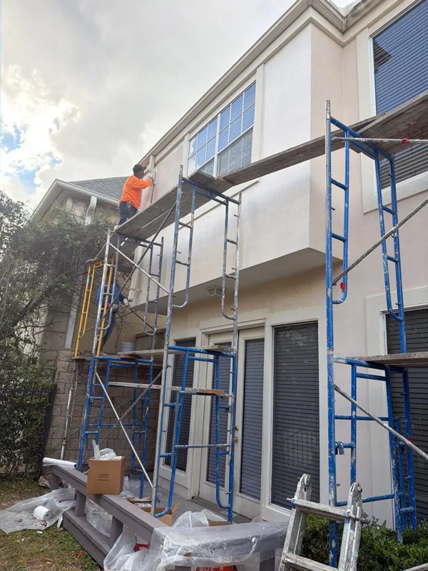 Scaffolding across the front of the townhome