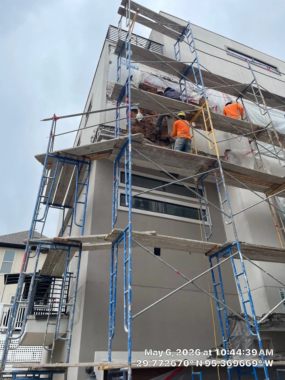 Scaffolding reaching several levels of the exterior