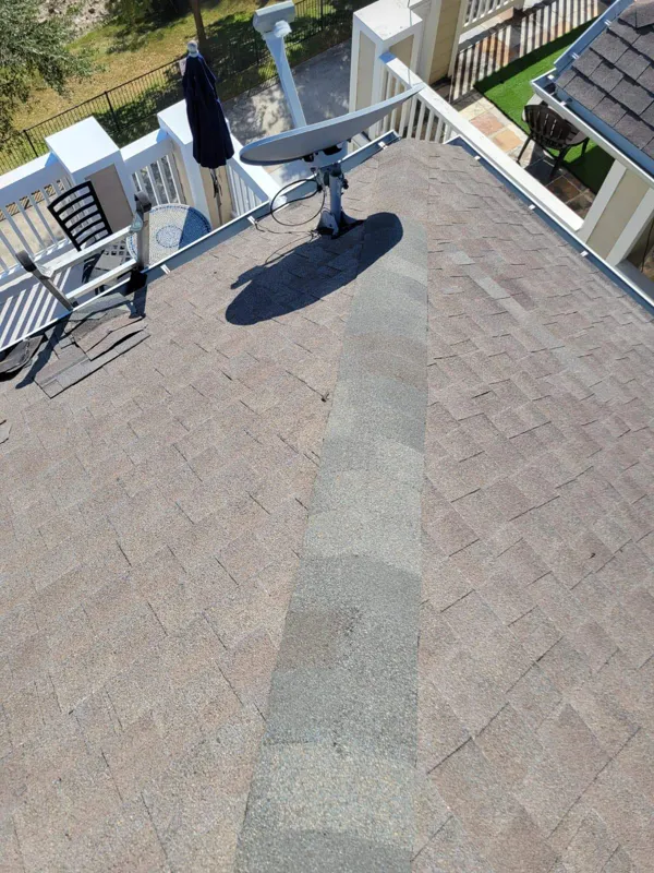 Shingle roof plane and rooftop vent