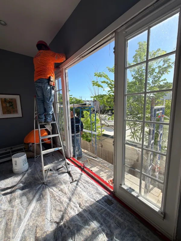 Protected interior opening during window-area work
