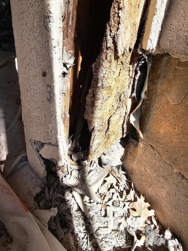 Exposed wood along a narrow window-edge repair