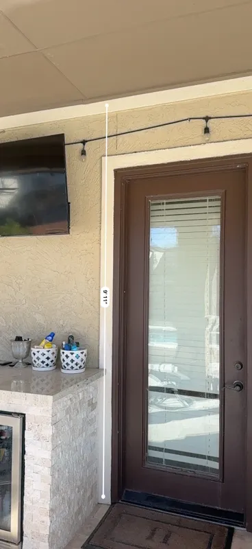 Covered entry beside the garage