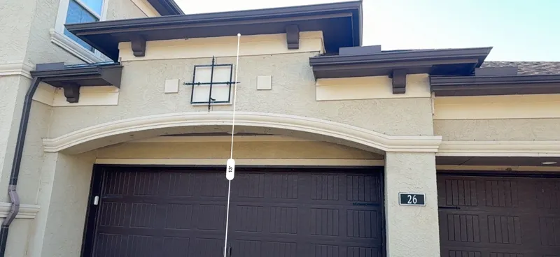 Stucco arch over a residential garage