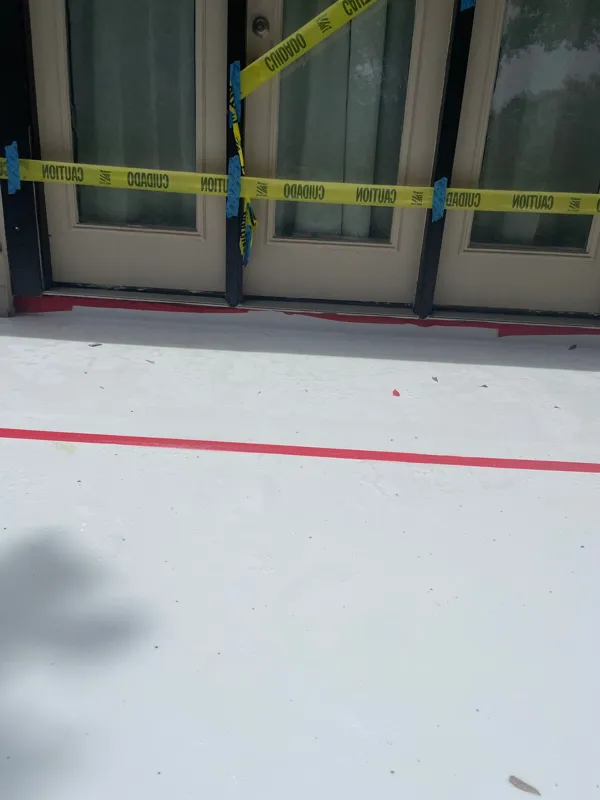 Membrane and taped details at an exterior doorway