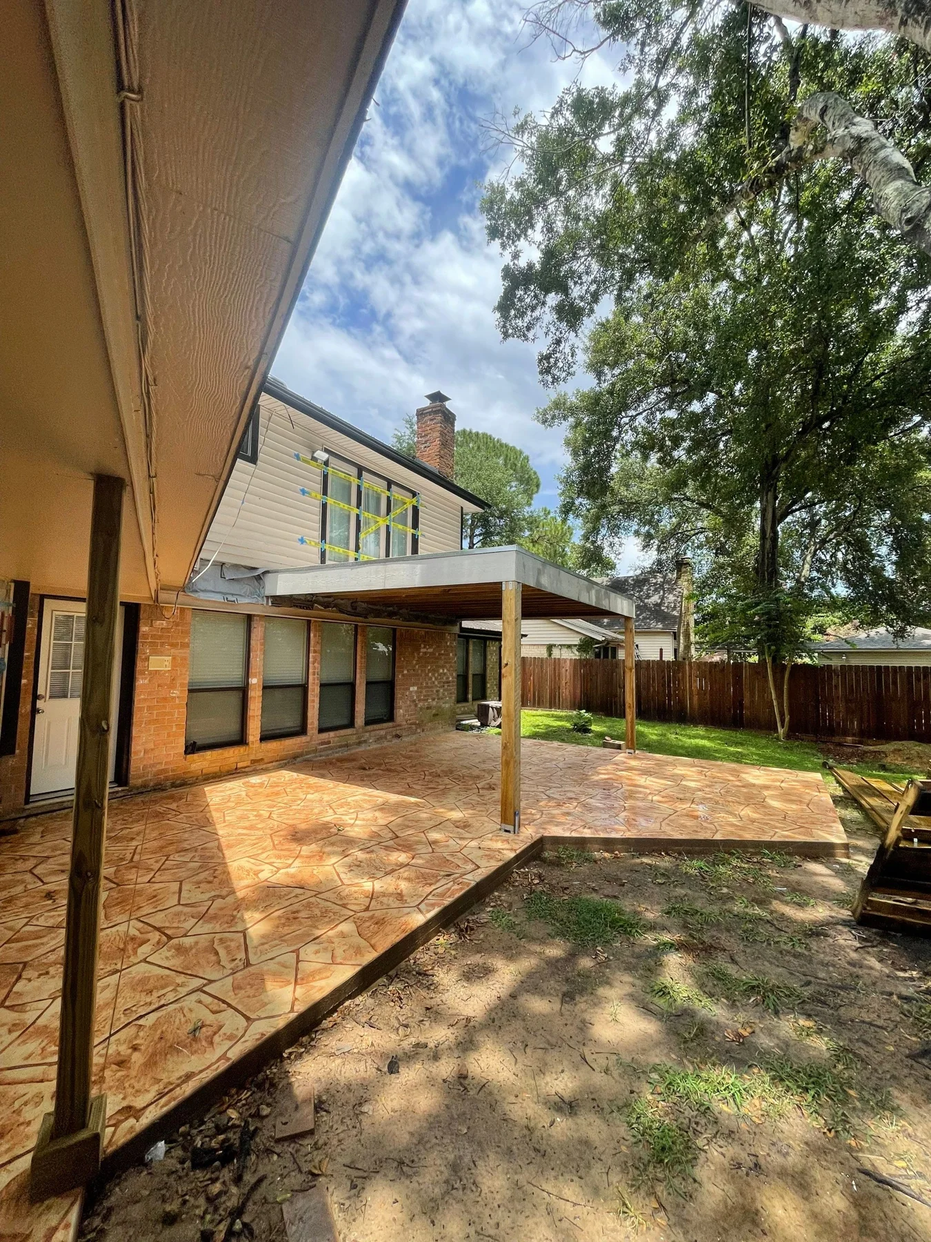 Deck structure and outdoor area seen from the yard