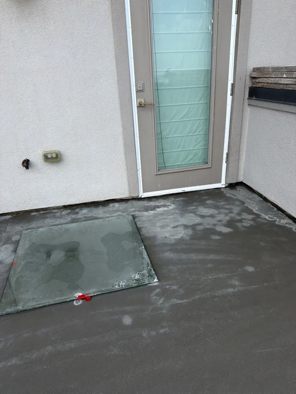 Balcony surface at an exterior doorway