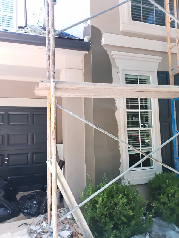 Prepared exterior wall around tall windows