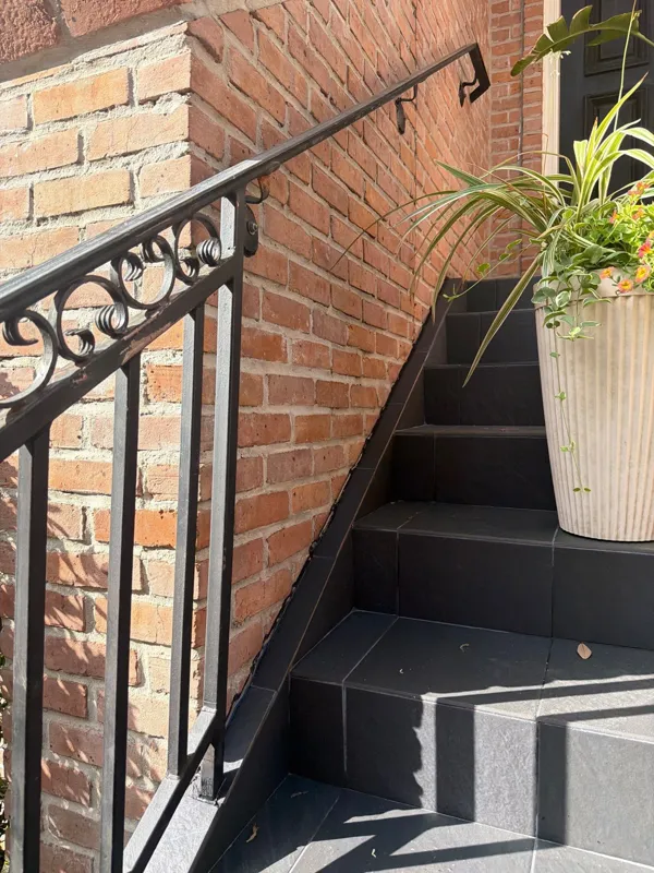 stair side and metal railing