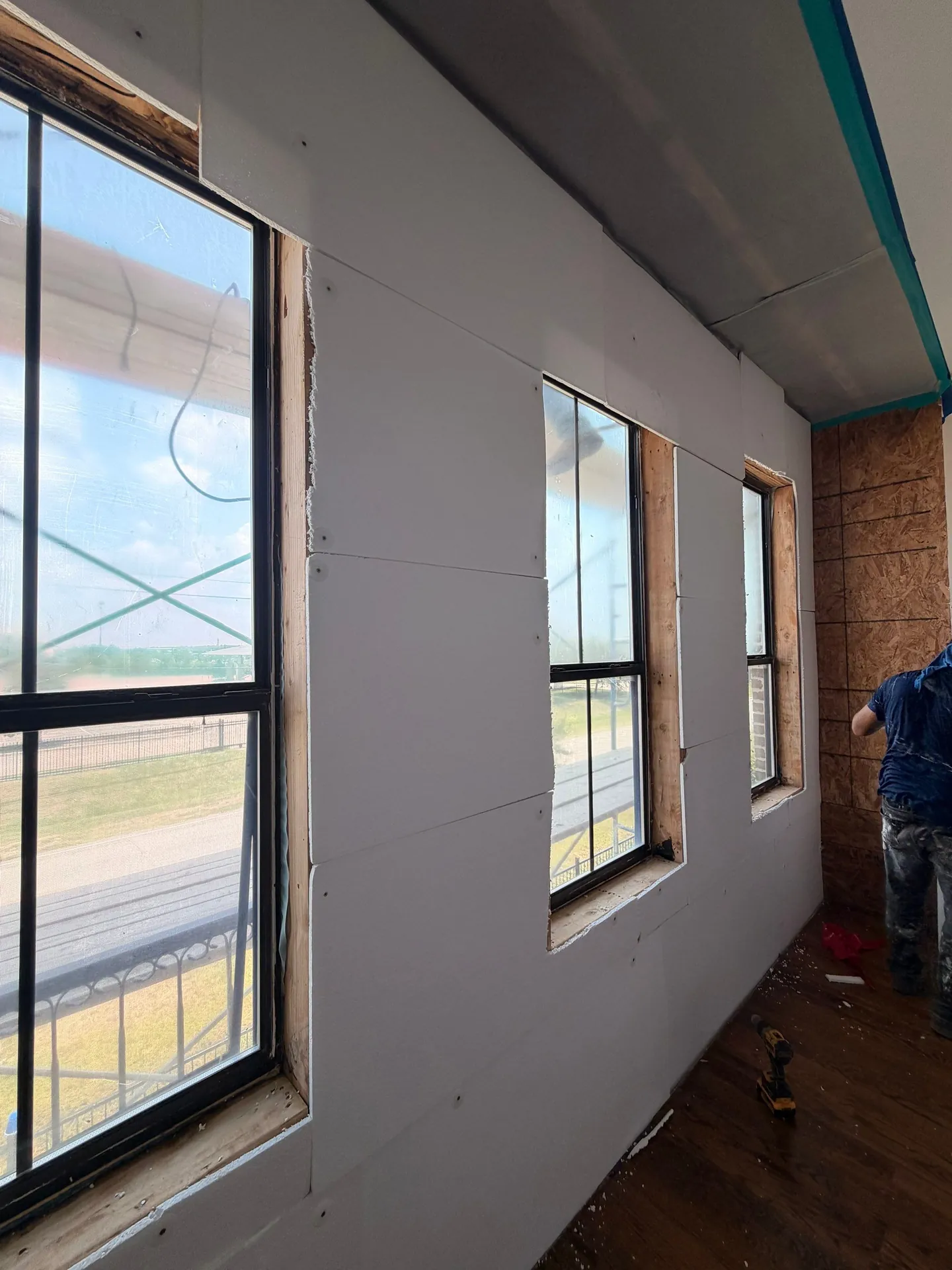 Interior wall reconstruction around windows during a repair